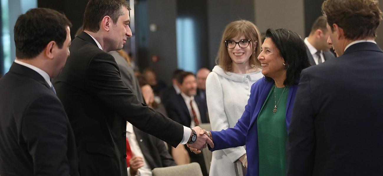 Georgian President Salome Zourabichvili greeting Prime Minister Giorgi Gakharia during the inaugural ceremony of the Kutaisi International University.