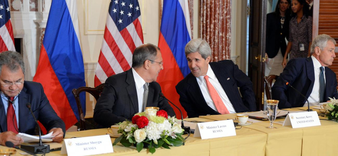 U.S. Secretary of State talking to Russian Foreign Minister Sergei Lavrov.