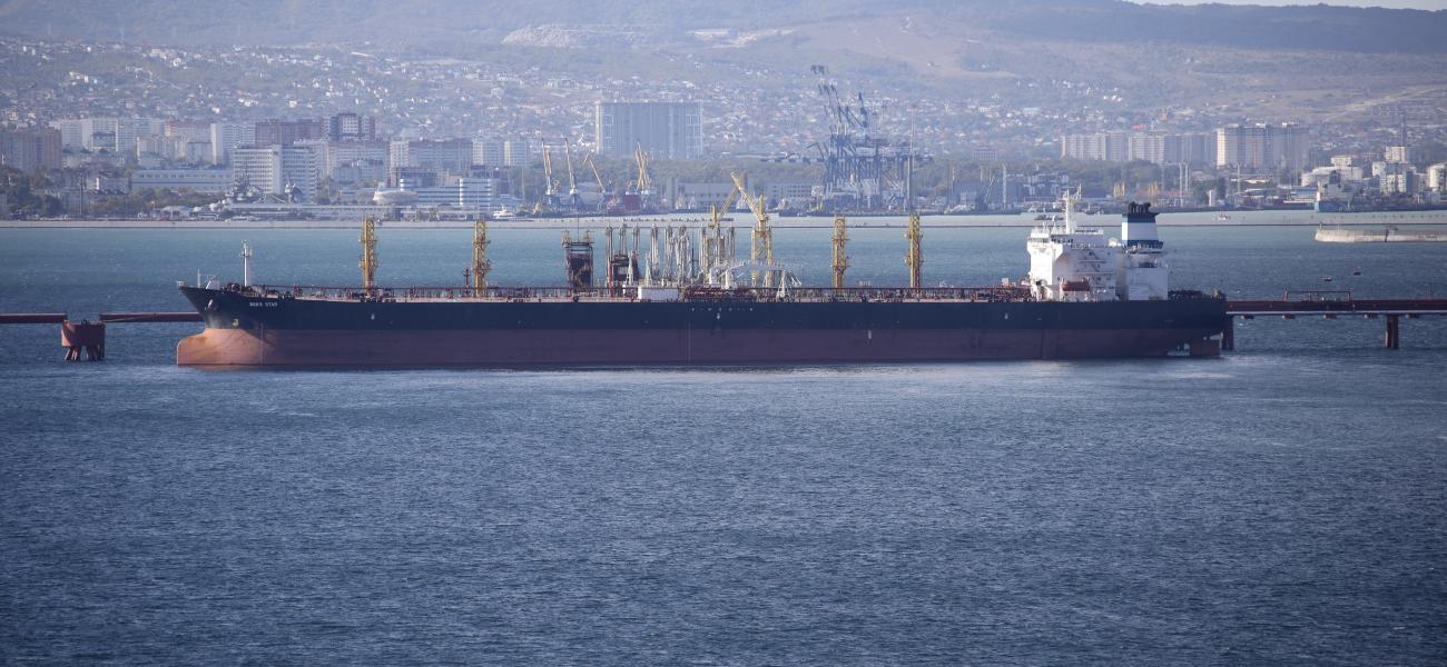 An oil tanker is moored at the Sheskharis complex, part of Chernomortransneft JSC, a subsidiary of Transneft PJSC, in Novorossiysk, Russia, on Oct. 11, 2022. A Russian official says the country will will cut oil production by 500,000 barrels per day next month in response to the West capping the price of its crude over the war in Ukraine. According to multiple Russian news media reports, Deputy Prime Minister Alexander Novak said Friday, Feb. 10, 2023 that “we will not sell oil to those who directly or indi