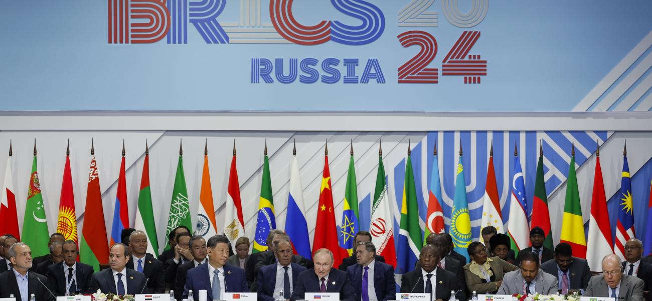 From left, Iranian President Masoud Pezeshkian, Egyptian President Abdel Fattah el-Sisi, Chinese President Xi Jinping, Russian President Vladimir Putin, South African President Cyril Ramaphosa, Ethiopian Prime Minister Abiy Ahmed and Brazilian Foreign Minister Mauro Vieira attend the Outreach/BRICS Plus format session at the BRICS Summit in Kazan, Russia.