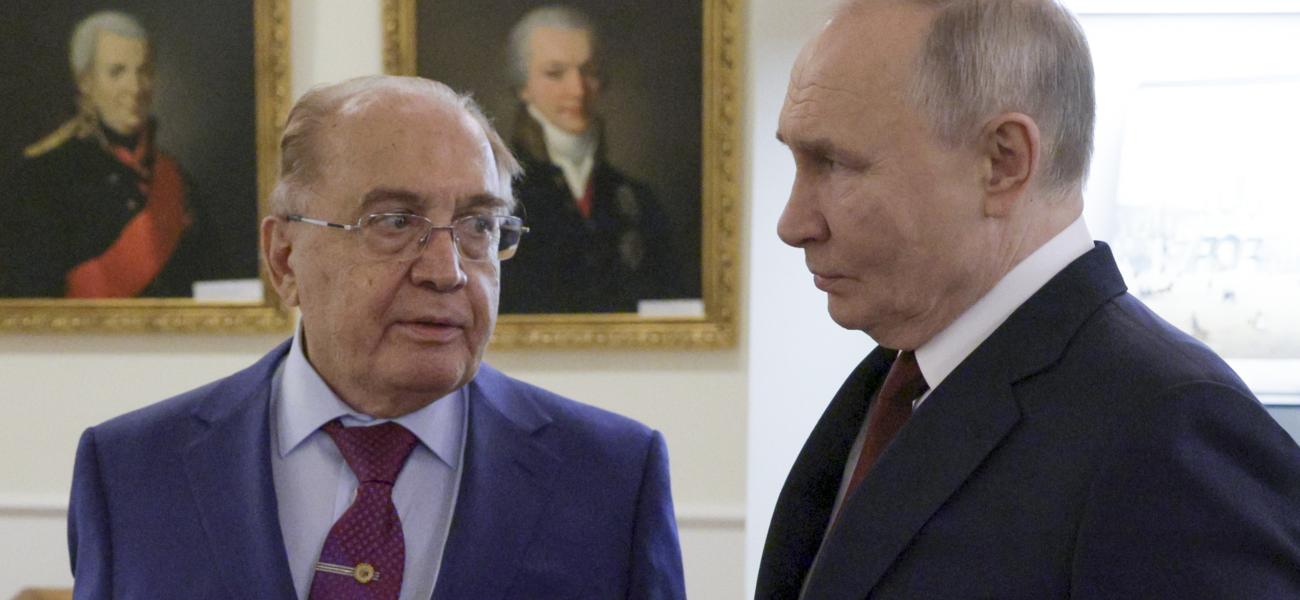 Russian President Vladimir Putin, right, accompanied by Lomonosov Moscow State University Rector Viktor Sadovnichy, visits an exhibition at the History Museum of the Lomonosov Moscow State University