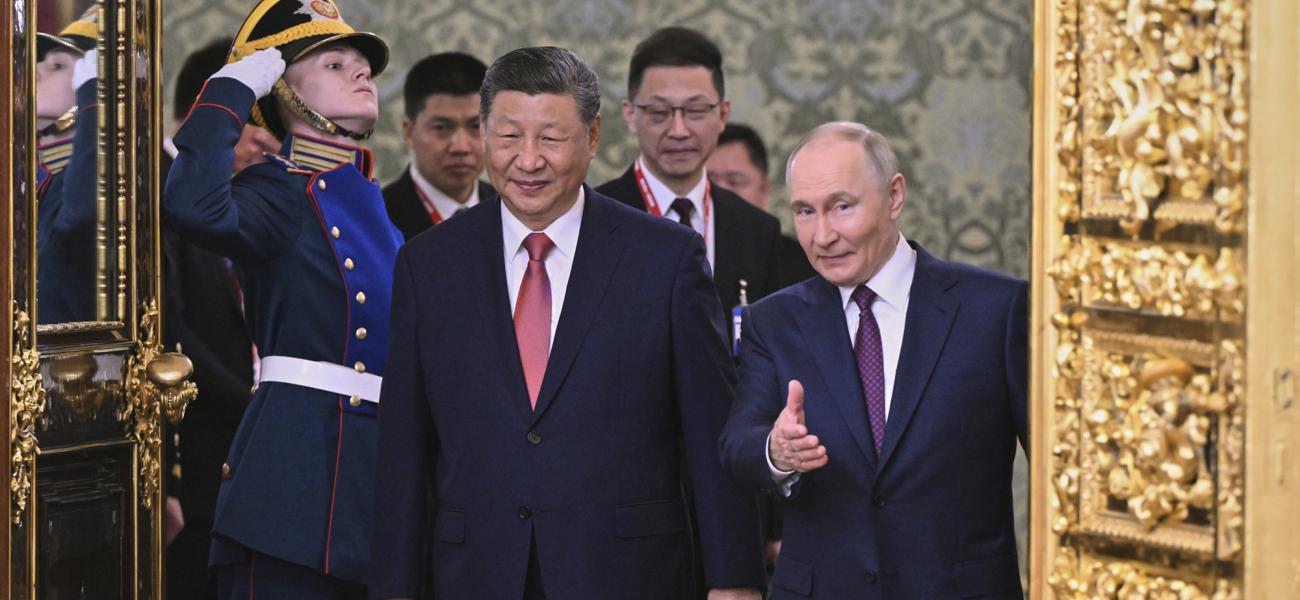 Russian President Vladimir Putin, right, and his Chinese counterpart Xi Jinping arrive for their talks at the Kremlin in Moscow, Russia, Thursday, May 8, 2025, ahead of celebrations of the 80th anniversary of the Soviet Union's victory over Nazi Germany during the World War II. (Alexei Danichev/Photo host agency RIA Novosti via AP)