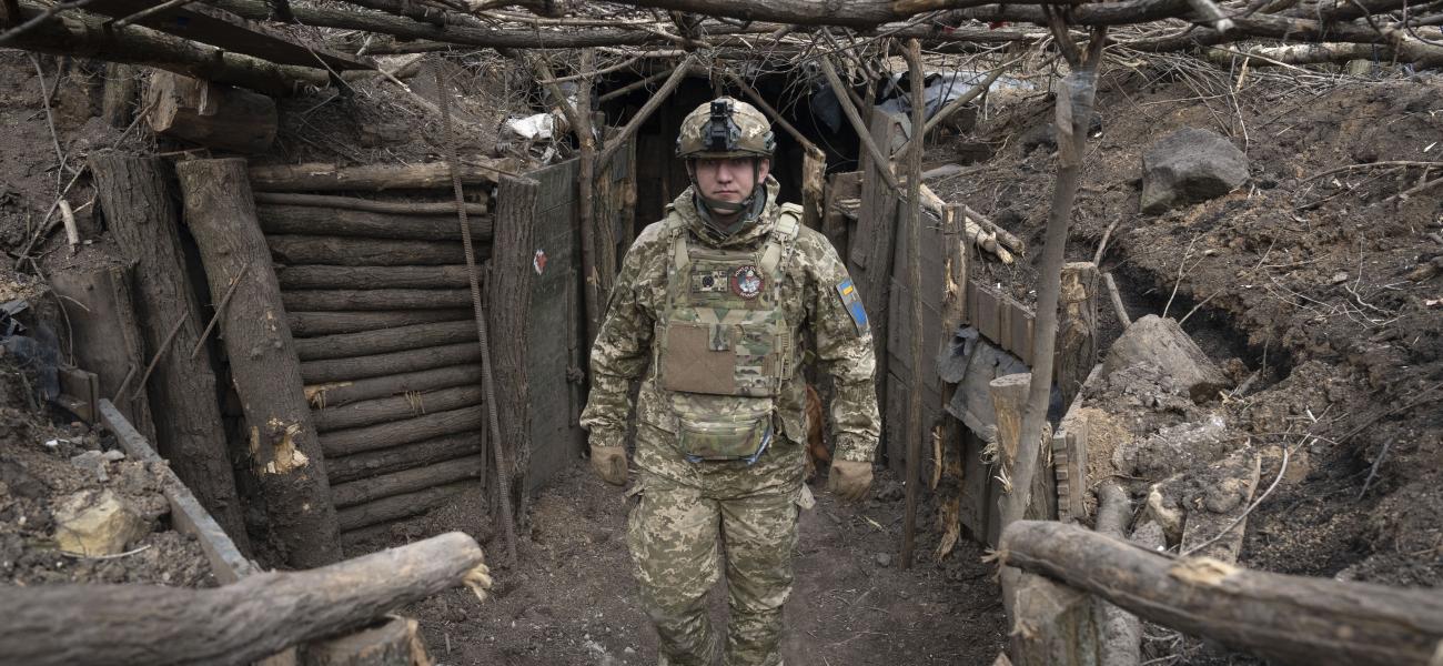 A Ukrainian serviceman of the 28th Separate Mechanised Brigade stands in a trench at the front line, near Bakhmut, Donetsk region, Ukraine, March 3, 2024. (AP Photo/Efrem Lukatsky, File)