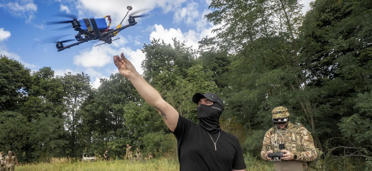 A Ukrainian serviceman of 57th motorised brigade controls an FPV drone at the frontline in Kharkiv region, Ukraine Tuesday, Aug. 12, 2025. (AP Photo/Andrii Marienko)