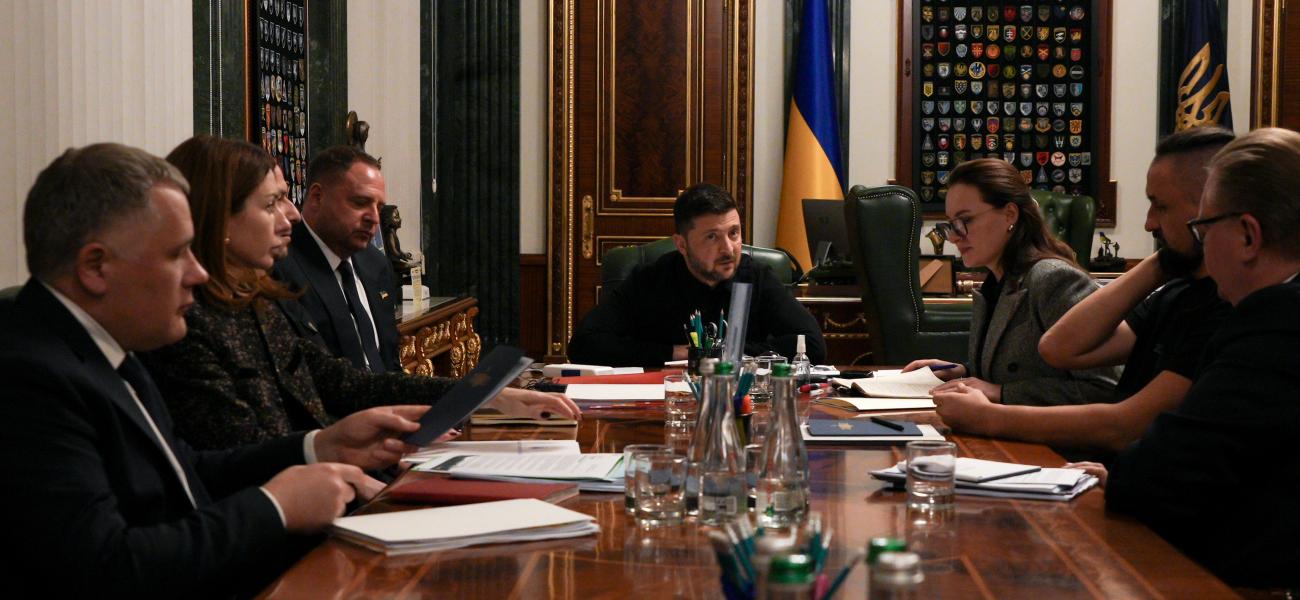 Ukraine's President Volodymyr Zelenskyy, surrounded by administration officials, speaks during a news conference in Kyiv, Ukraine, Monday, Nov. 3, 2025. (AP Photo/Andrea Rosa)