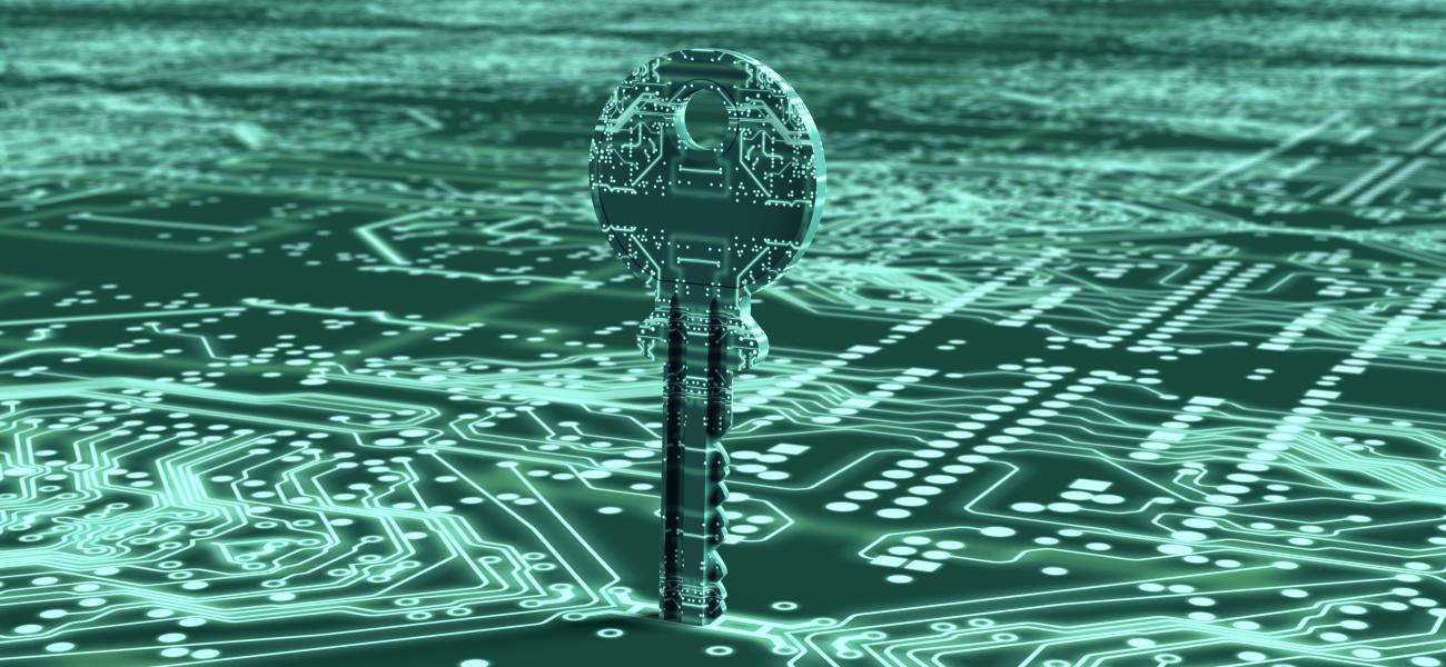 A key made out of circuits unlocking a circuit board.
