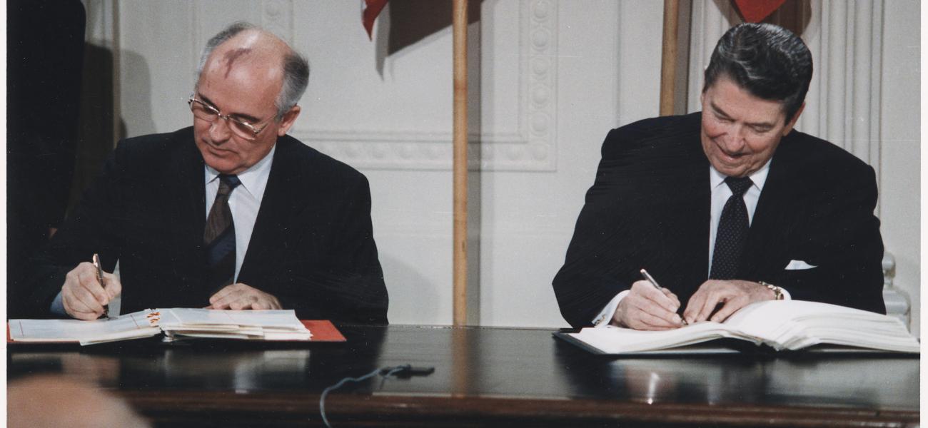 U.S. President Ronald Reagan and General Secretary of the Soviet Union Mikhail Gorbachev signing the INF Treaty in the East Room of the White House.