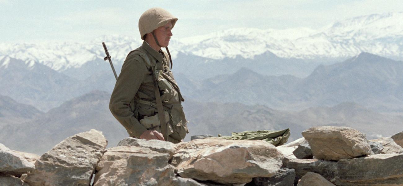 A Soviet soldier on watch in Afghanistan, 1988.