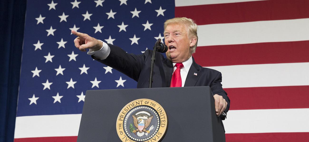 U.S. President Donald Trump at podium.