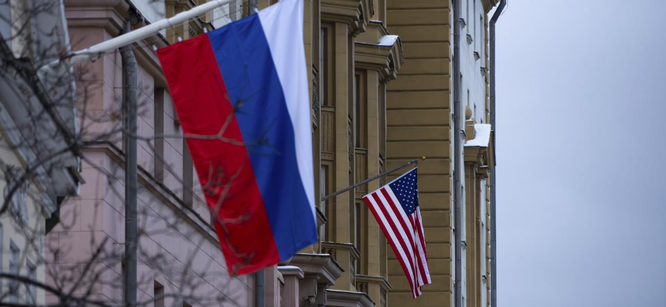 The U.S. Embassy with a U.S. national flag, seen behind a building with a Russian national flag in Moscow, Russia, Tuesday, Nov. 5, 2024.