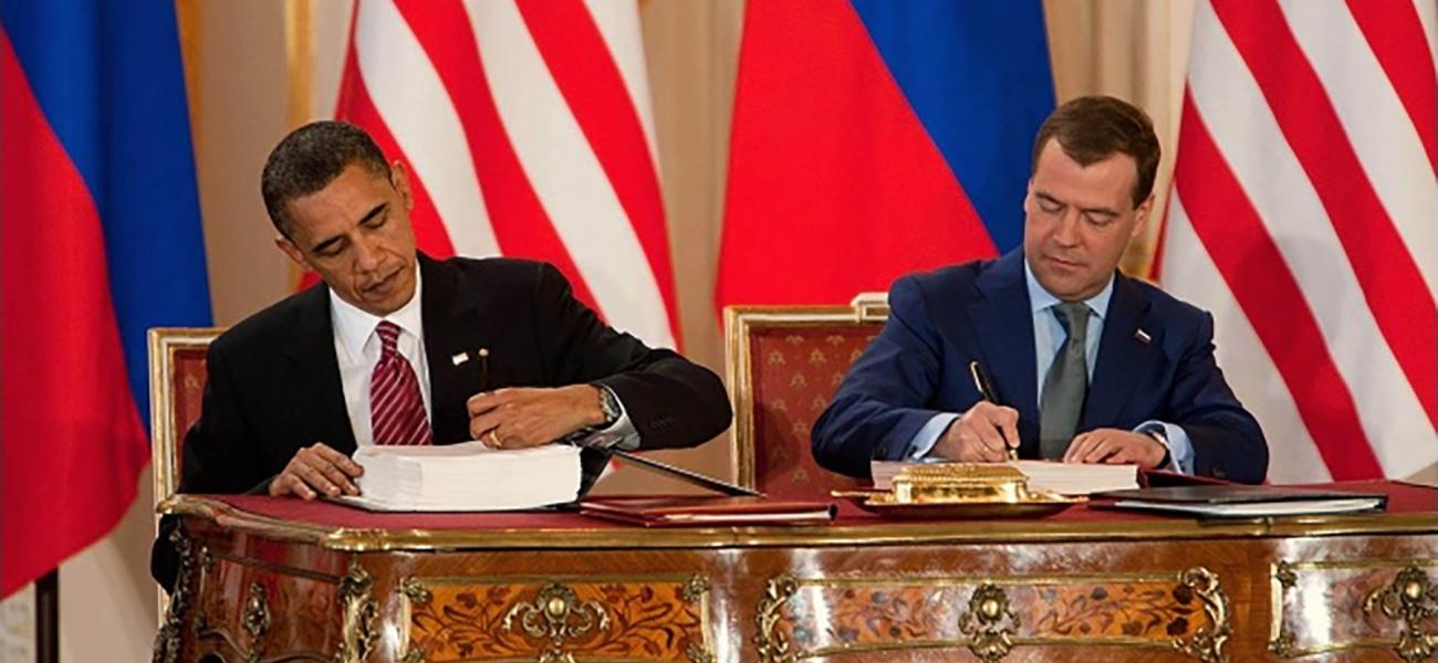 Former U.S. President Barak Obama and former Russian President Dmitry Medvedev sign the New START treaty in 2010.