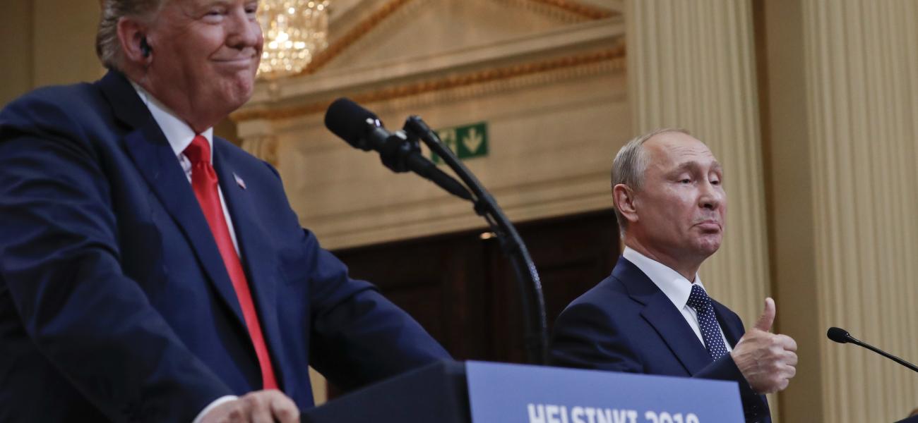 Russian President Vladimir Putin, right, and U.S. President Donald Trump give a joint news conference at the Presidential Palace in Helsinki, Finland, July 16, 2018.