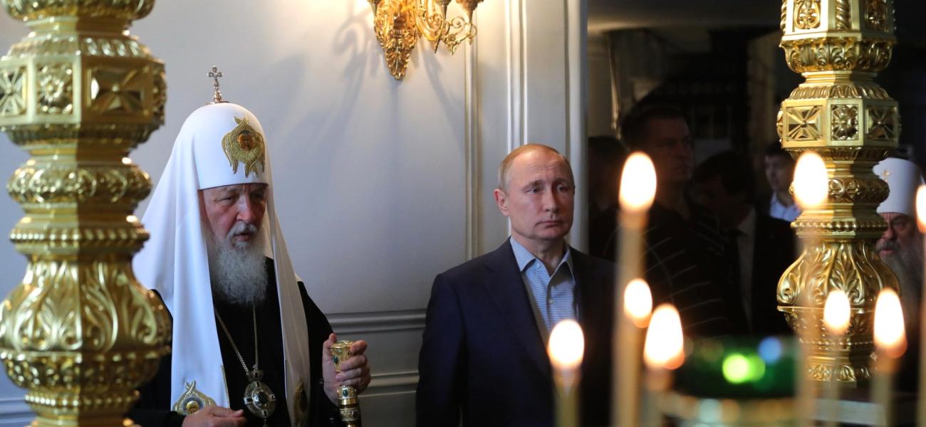 Putin and Kirill in church